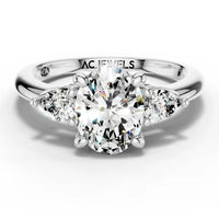 1ct Oval and Pear Trilogy Ring